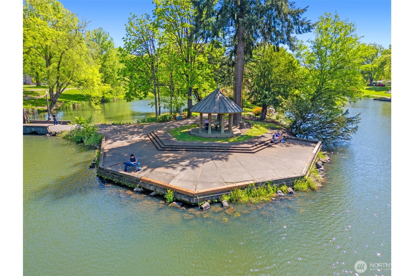 2039 Henderson Way Longview, WA 98632 - Photo 36 of 40 a wooden bench sitting in the middle of a yard