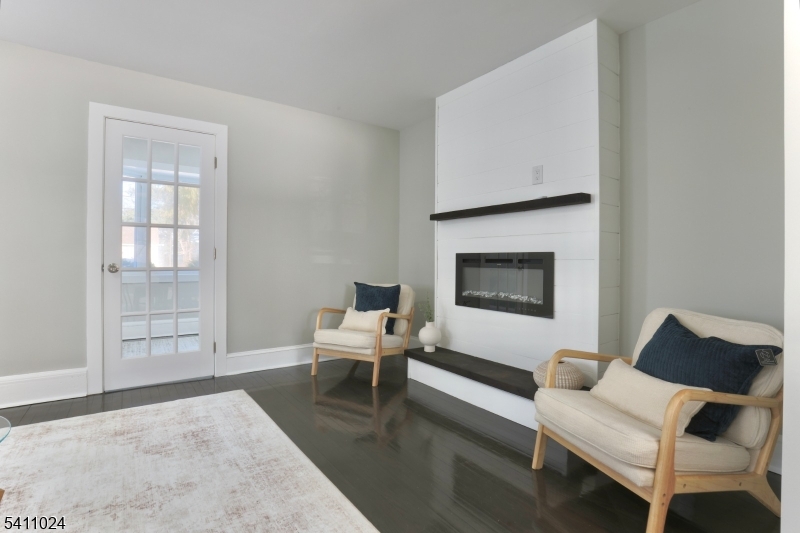 401 Burroughs Terrace Union, NJ 07083 - Photo 11 of 36 a living room with furniture and a flat screen tv
