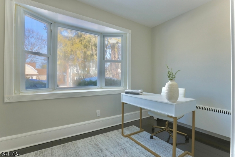 401 Burroughs Terrace Union, NJ 07083 - Photo 12 of 36 a view of a workspace with furniture and a window