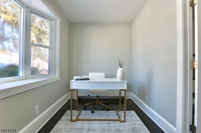 401 Burroughs Terrace Union, NJ 07083 - Photo 13 of 36 a view of a workspace with furniture and a window