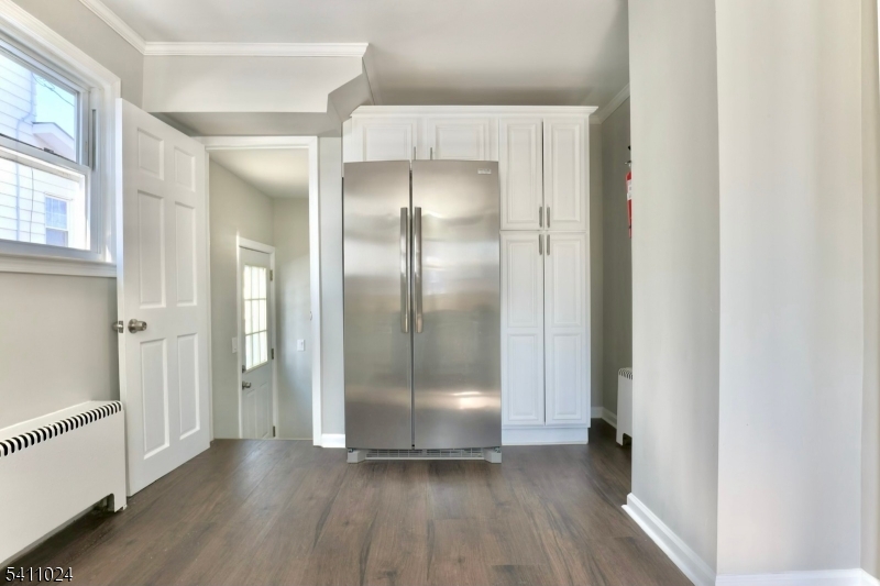 401 Burroughs Terrace Union, NJ 07083 - Photo 16 of 36 a view of a hallway with wooden floor