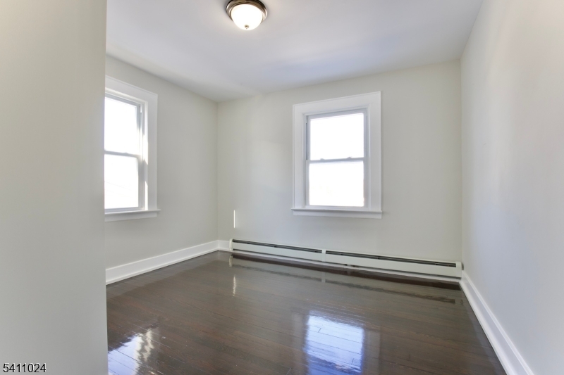 401 Burroughs Terrace Union, NJ 07083 - Photo 23 of 36 an empty room with a window
