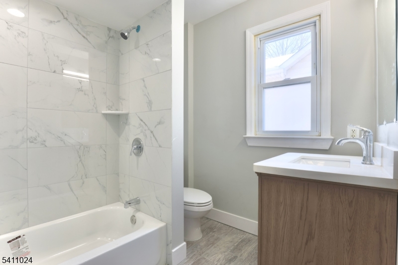 401 Burroughs Terrace Union, NJ 07083 - Photo 24 of 36 a bathroom with a sink toilet tub and shower