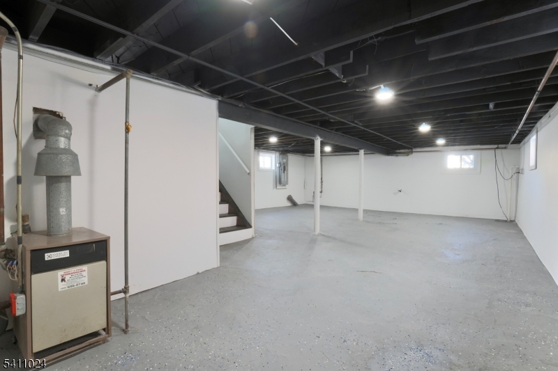 401 Burroughs Terrace Union, NJ 07083 - Photo 26 of 36 a view of an empty room with a fireplace