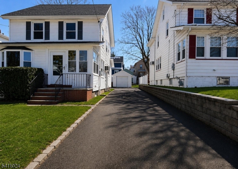 401 Burroughs Terrace Union, NJ 07083 - Photo 33 of 36 a front view of a house with a yard