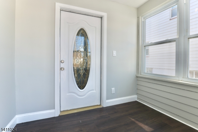 401 Burroughs Terrace Union, NJ 07083 - Photo 4 of 36 a view of a small space with wooden floor and a window