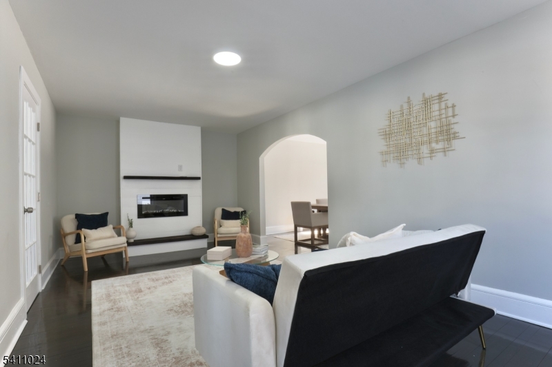 401 Burroughs Terrace Union, NJ 07083 - Photo 6 of 36 a bedroom with furniture and a fireplace