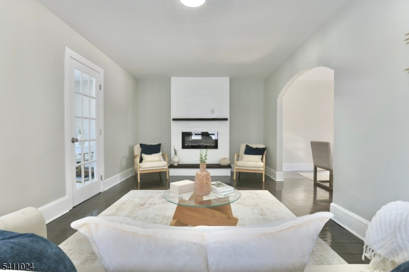 401 Burroughs Terrace Union, NJ 07083 - Photo 7 of 36 a living room with furniture and a fireplace