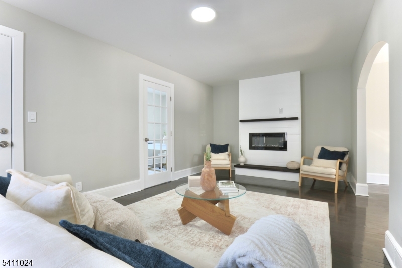 401 Burroughs Terrace Union, NJ 07083 - Photo 8 of 36 a living room with furniture and a fireplace