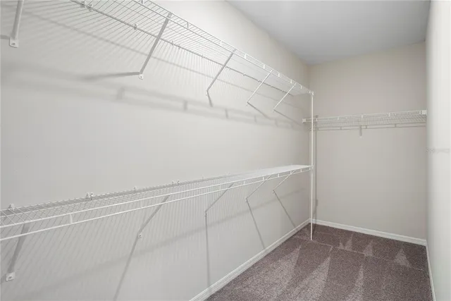 a view of a room with racks on the wall