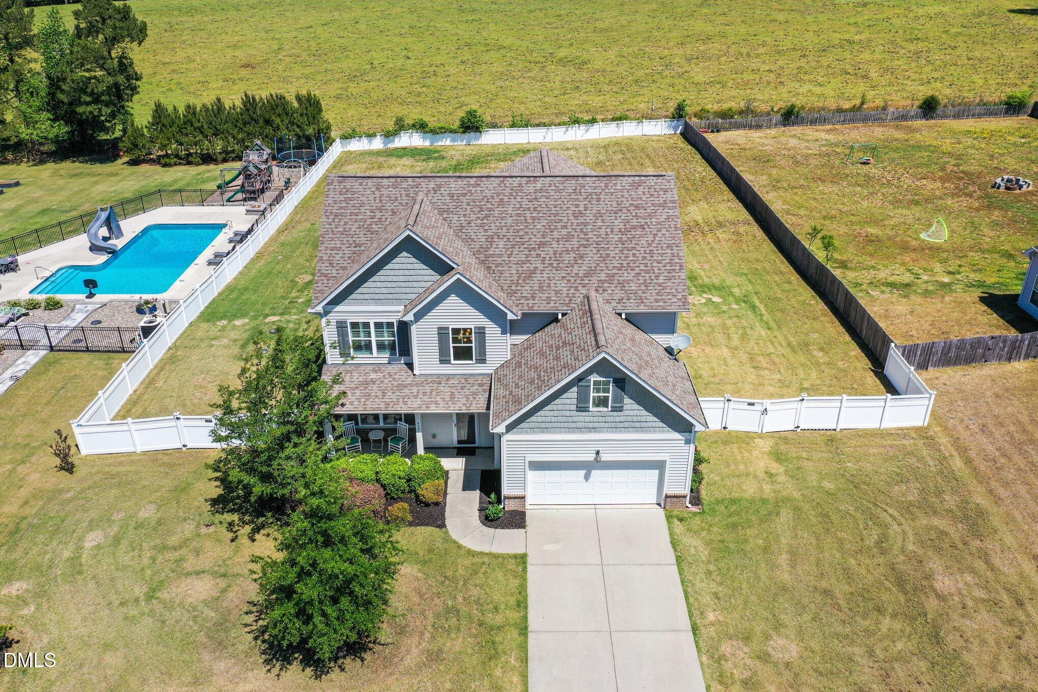 432 Seabring Lane Raleigh, NC 27603 - Photo 28 of 29 a view of a house with a ocean view
