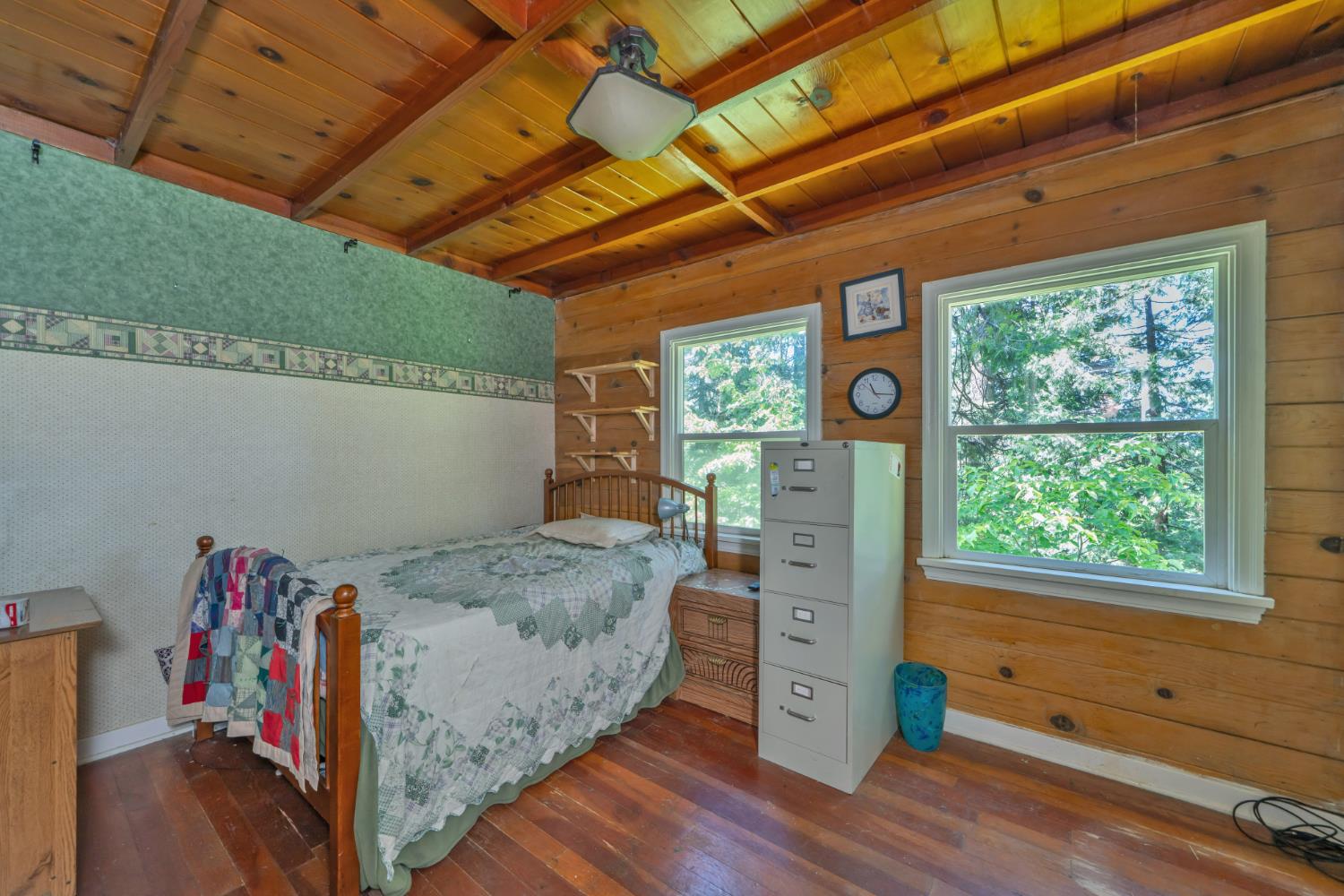 6929 Split Bend Road Pollock Pines, CA 95726 - Photo 27 of 38 a bed room with a bed and a window
