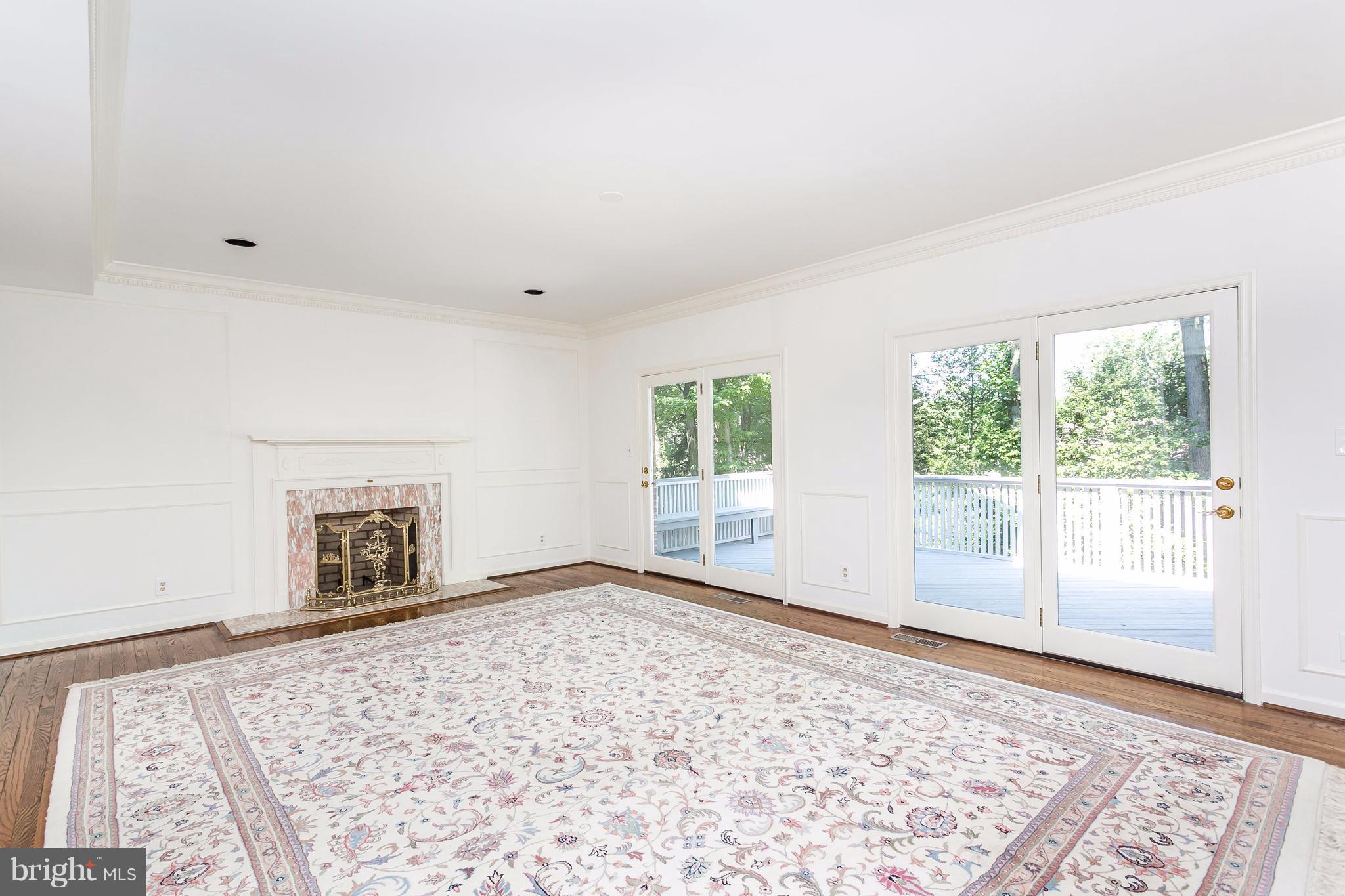 6 Johnson Mill Road Baltimore, MD 21204 - Photo 4 of 28 Spacious Living Room w/FP and Access to Deck