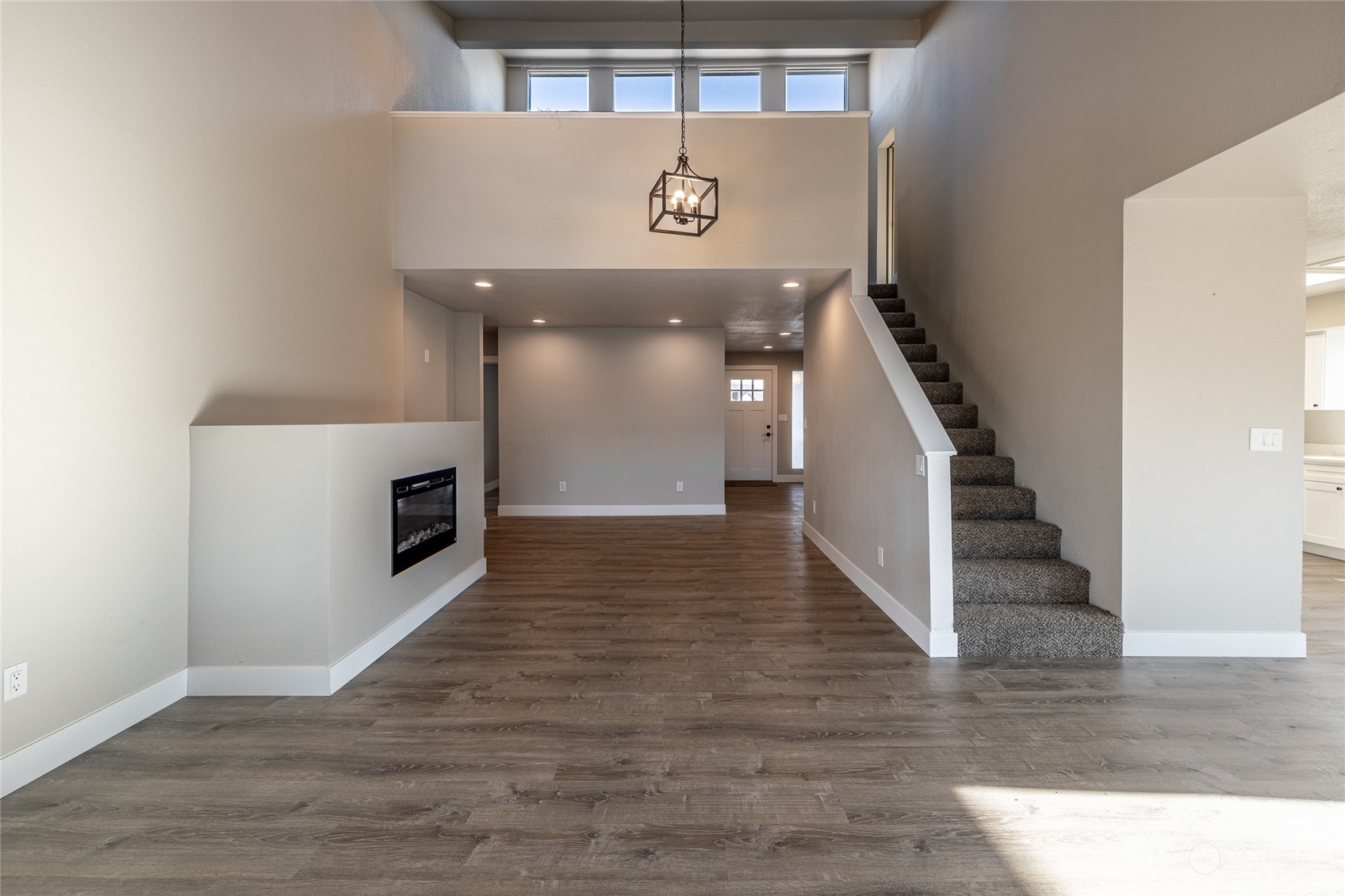 3125 Conarty Road Malaga, WA 98828 - Photo 13 of 37 a view of entryway and hall with wooden floor