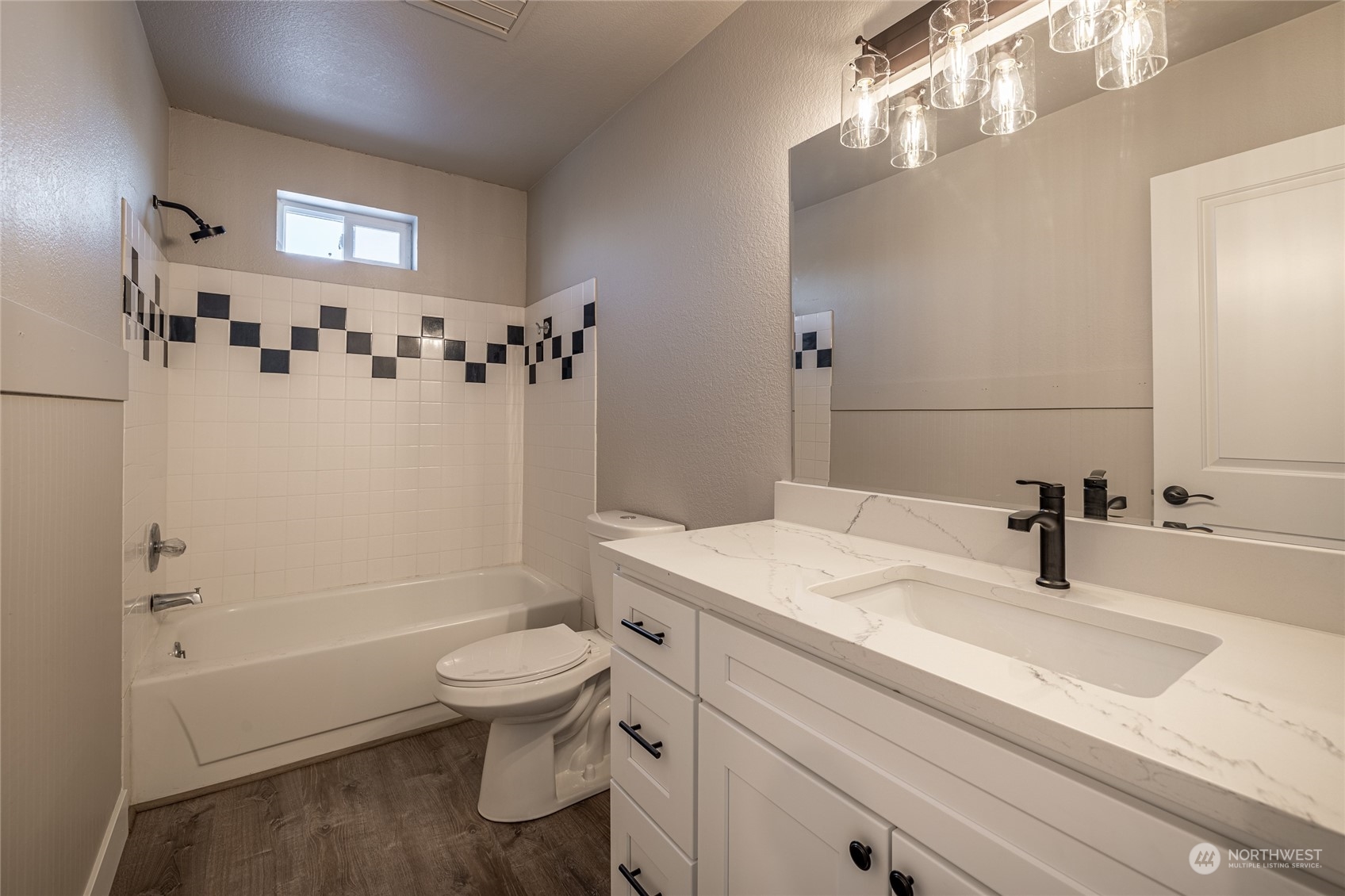 3125 Conarty Road Malaga, WA 98828 - Photo 23 of 37 a bathroom with a sink a toilet and shower