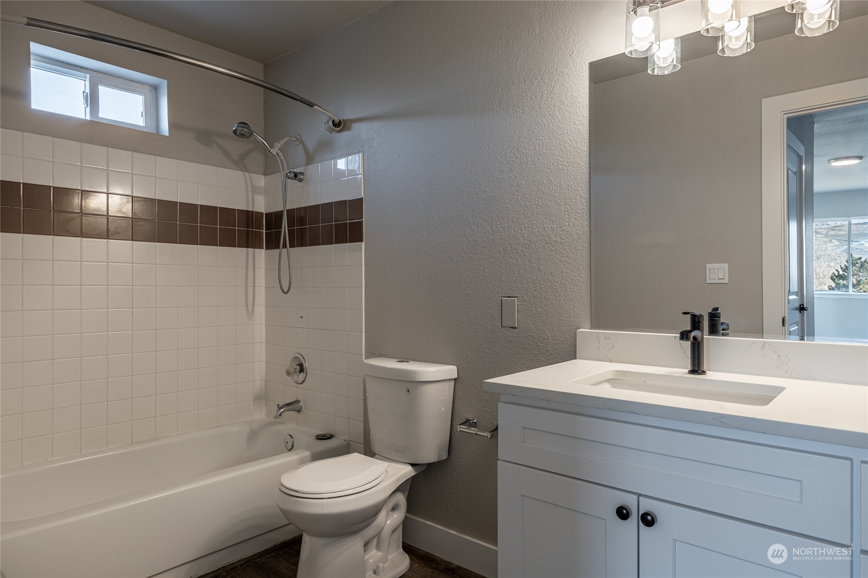 3125 Conarty Road Malaga, WA 98828 - Photo 26 of 37 a bathroom with a sink a toilet and shower