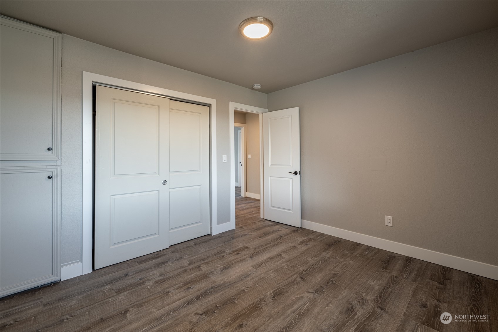 3125 Conarty Road Malaga, WA 98828 - Photo 27 of 37 wooden floor in an empty room