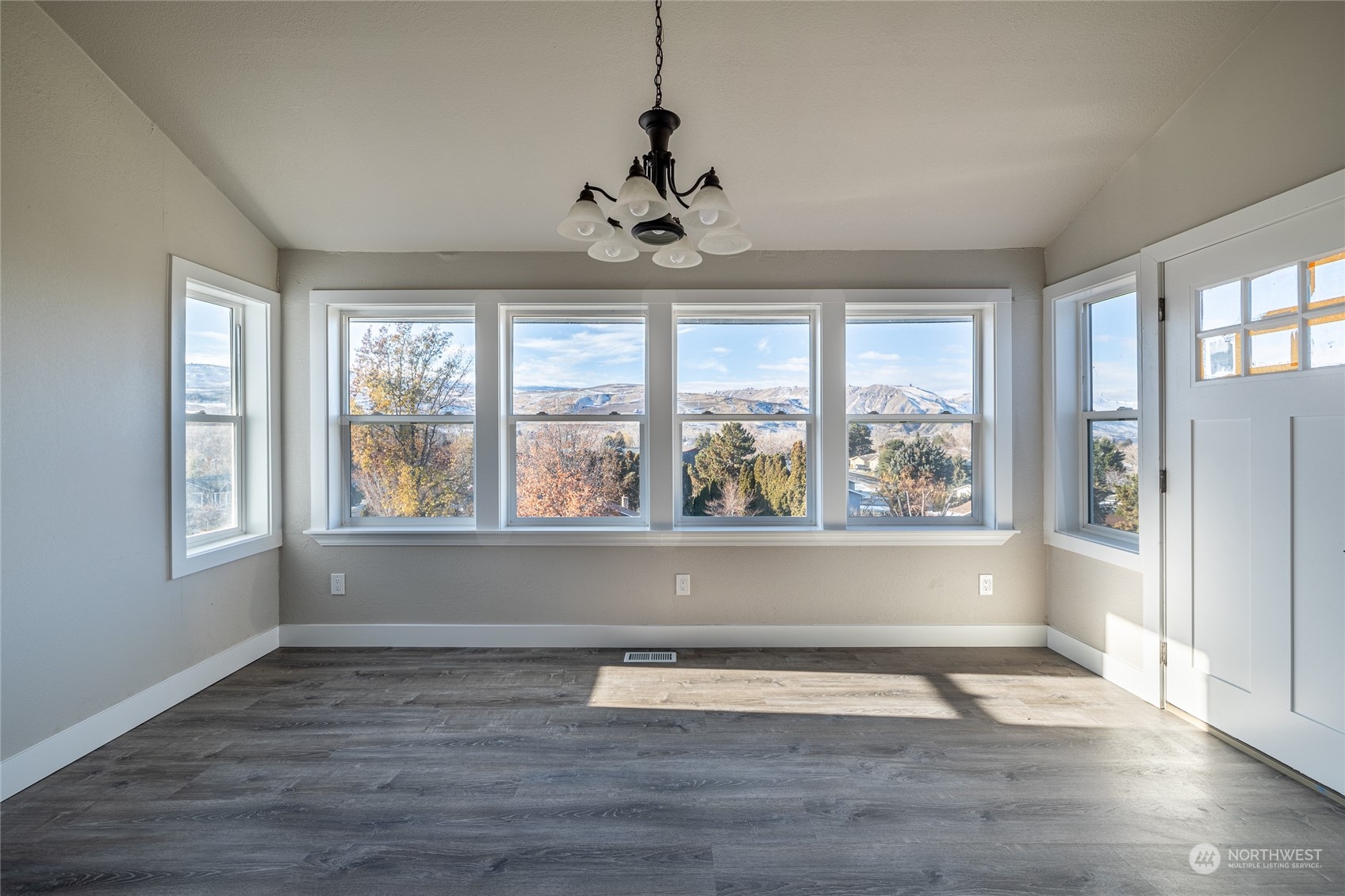 3125 Conarty Road Malaga, WA 98828 - Photo 10 of 37 a view of empty room with wooden floor and fan
