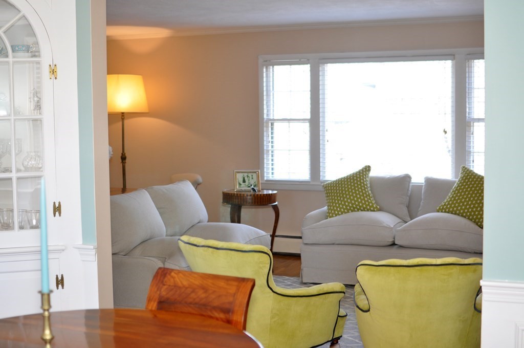51 Melvin Road Arlington, MA 02474 - Photo 16 of 42 a living room with furniture and a large window