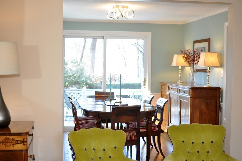 51 Melvin Road Arlington, MA 02474 - Photo 17 of 42 a view of a dining room with furniture and window