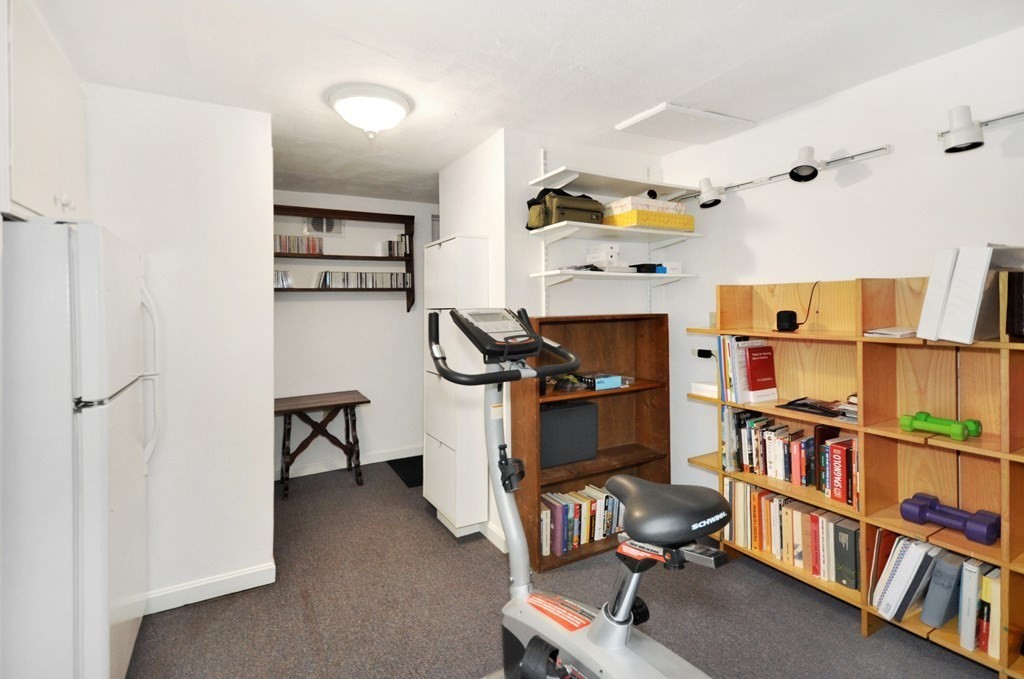 51 Melvin Road Arlington, MA 02474 - Photo 8 of 42 a view of a workspace with furniture