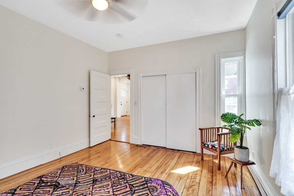 12 Rindge Avenue, Unit 2 Cambridge, MA 02140 - Photo 16 of 25 a view of a livingroom with a potted plant