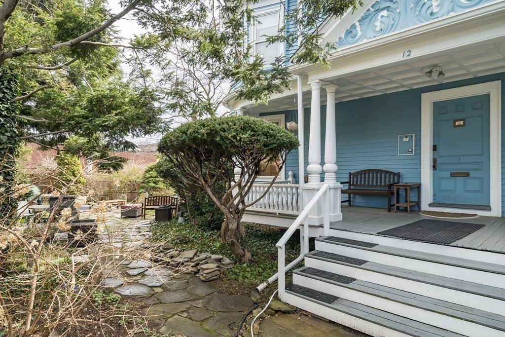 12 Rindge Avenue, Unit 2 Cambridge, MA 02140 - Photo 22 of 25 a house with trees in front of it