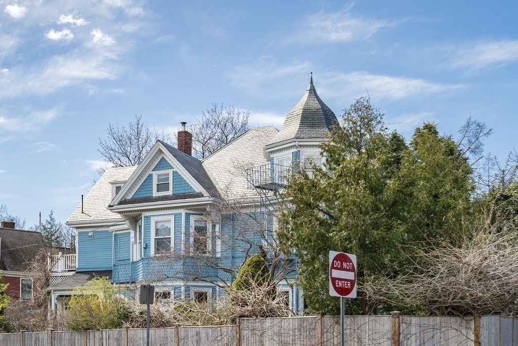 12 Rindge Avenue, Unit 2 Cambridge, MA 02140 - Photo 23 of 25 a front view of a house with a garage