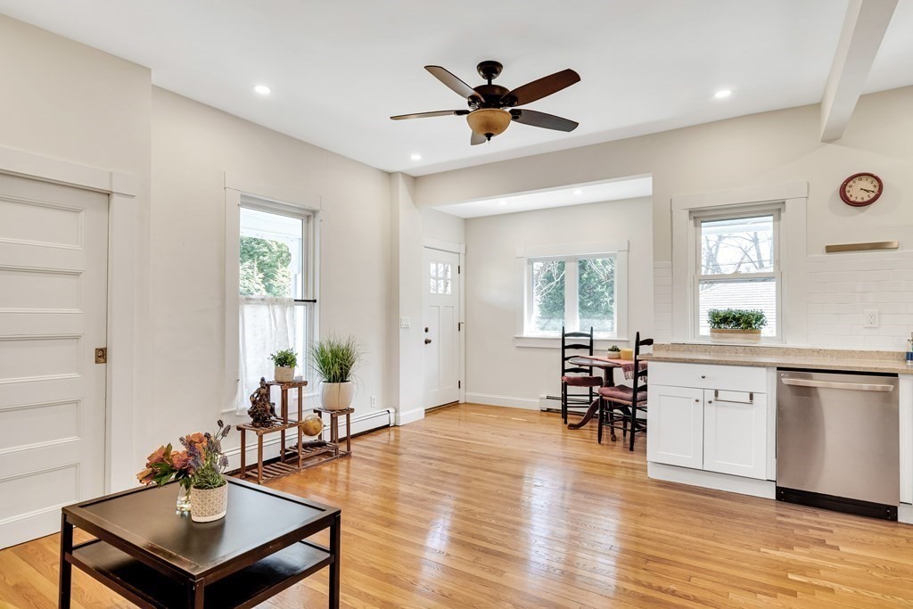 12 Rindge Avenue, Unit 2 Cambridge, MA 02140 - Photo 6 of 25 a living room with furniture wooden floor and a window