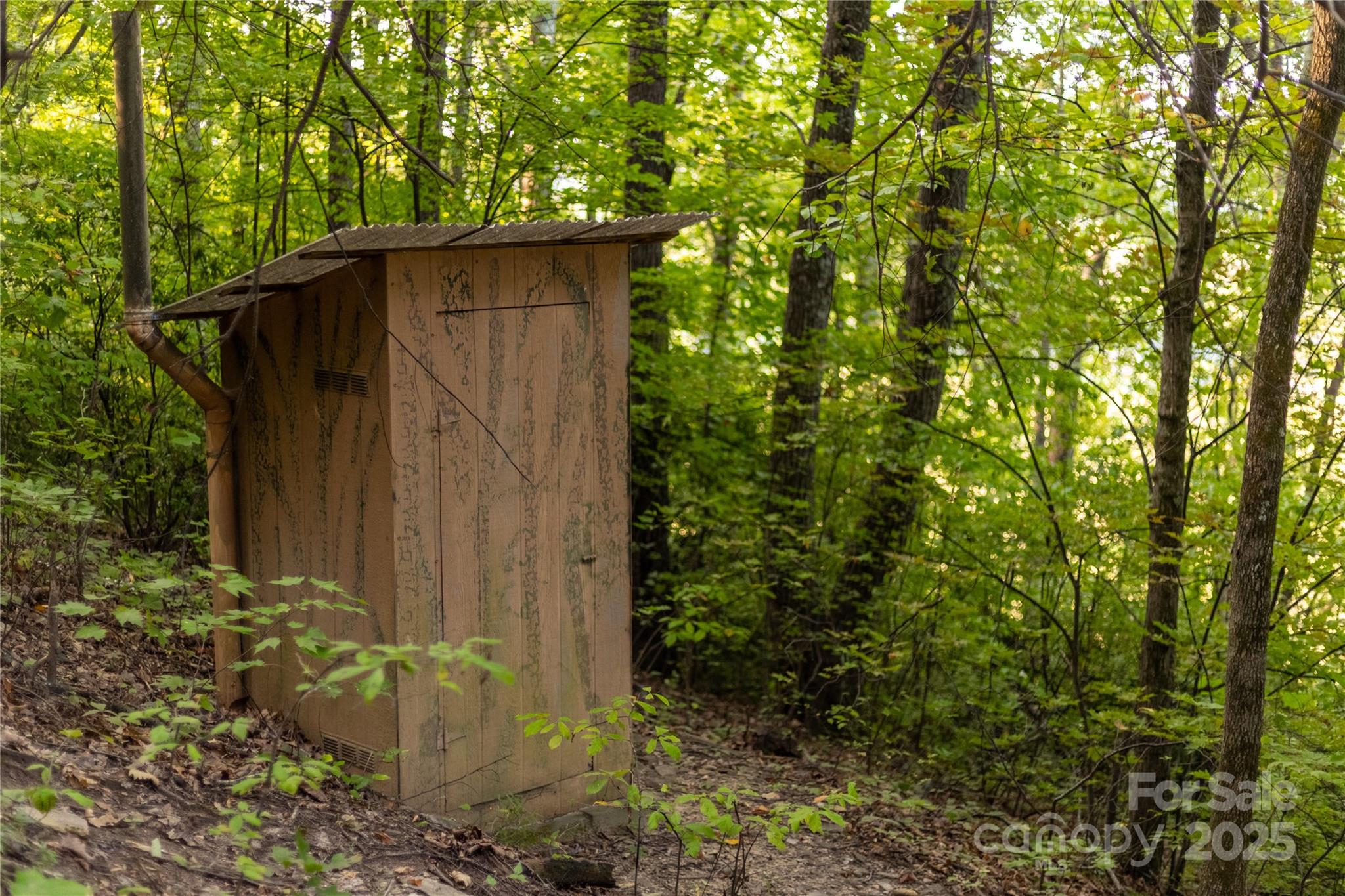 Tbd Old Clear Creek Road Hendersonville, NC 28792 - Photo 16 of 19 a backyard of a house with lots of green space