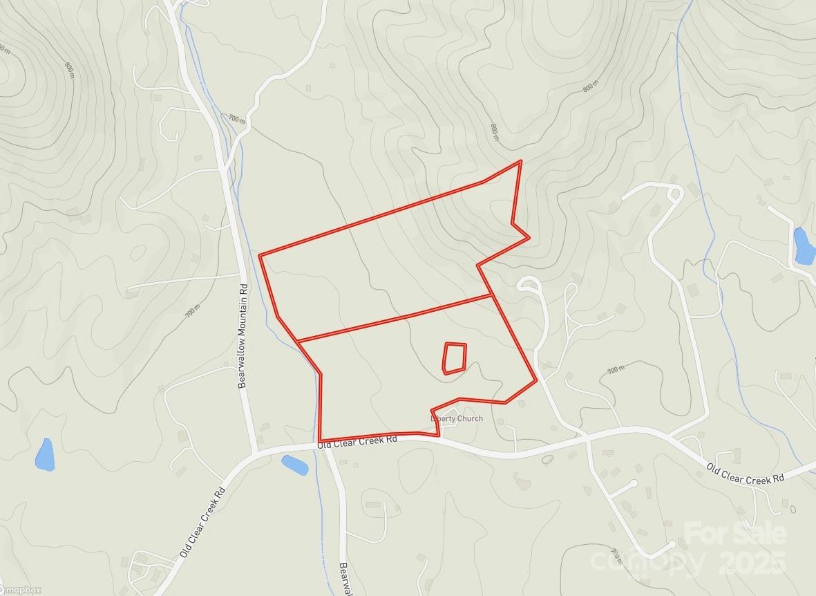 Tbd Old Clear Creek Road Hendersonville, NC 28792 - Photo 9 of 19 a close up of a wall with a shower