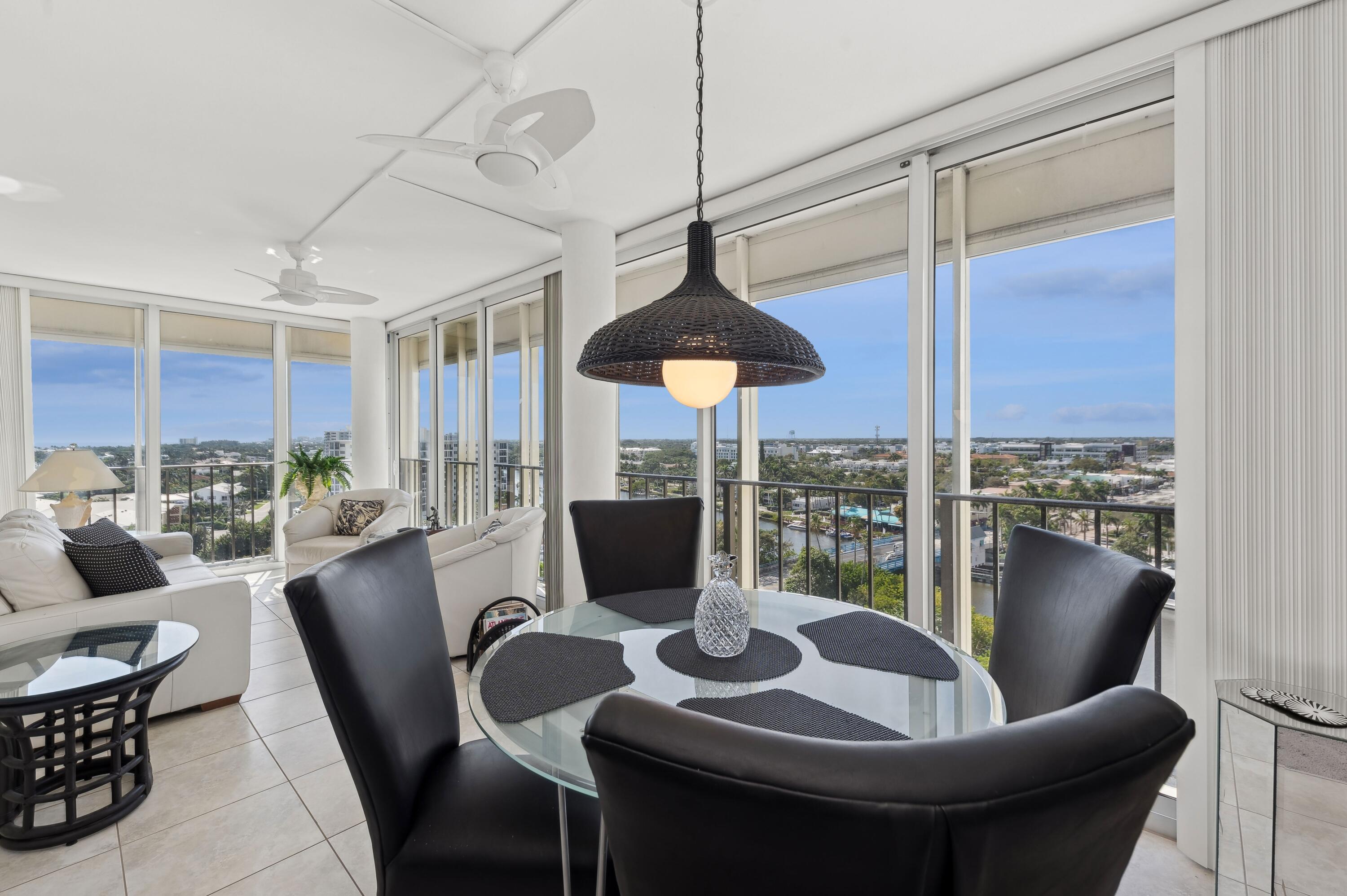 50 E Road, Unit 11F Delray Beach, FL 33483 - Photo 11 of 31 a view of a dining room with furniture window and outside view