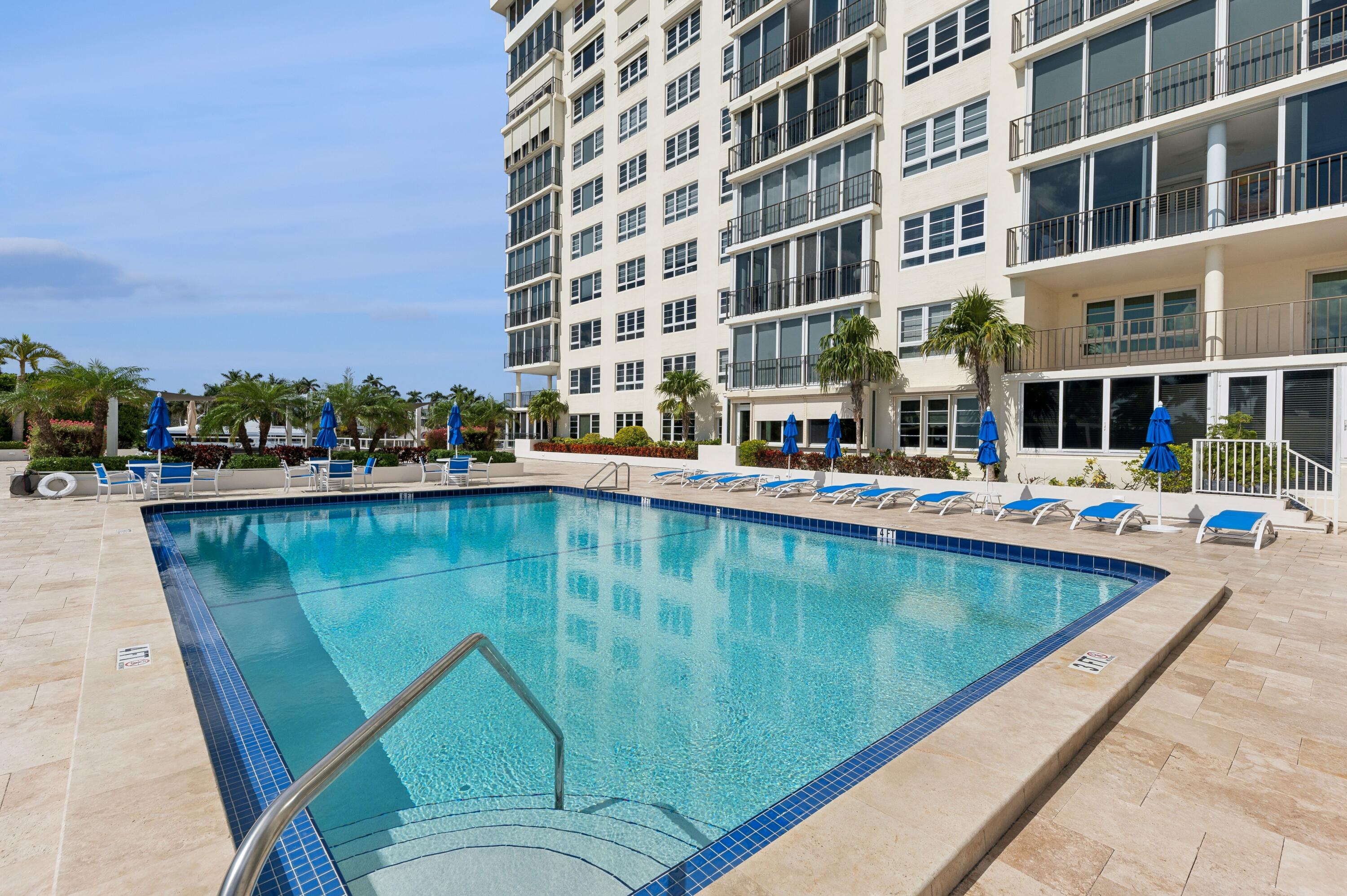 50 E Road, Unit 11F Delray Beach, FL 33483 - Photo 25 of 31 a view of swimming pool with outdoor seating and lake view