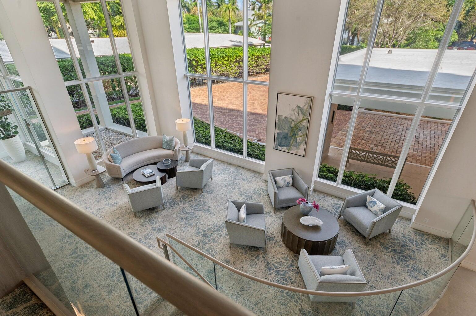 50 E Road, Unit 11F Delray Beach, FL 33483 - Photo 5 of 31 a dining room with furniture and a floor to ceiling window