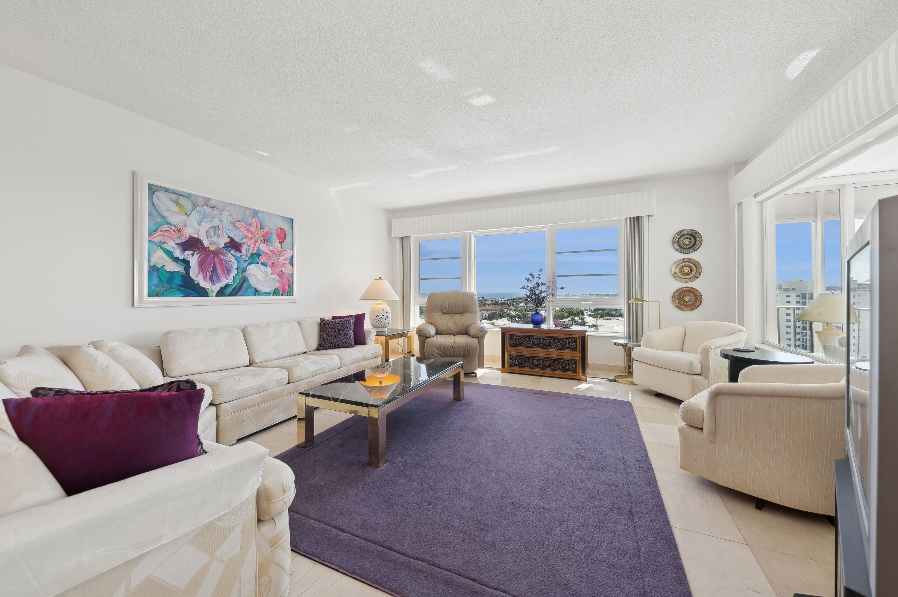 50 E Road, Unit 11F Delray Beach, FL 33483 - Photo 6 of 31 a living room with furniture kitchen view and a window