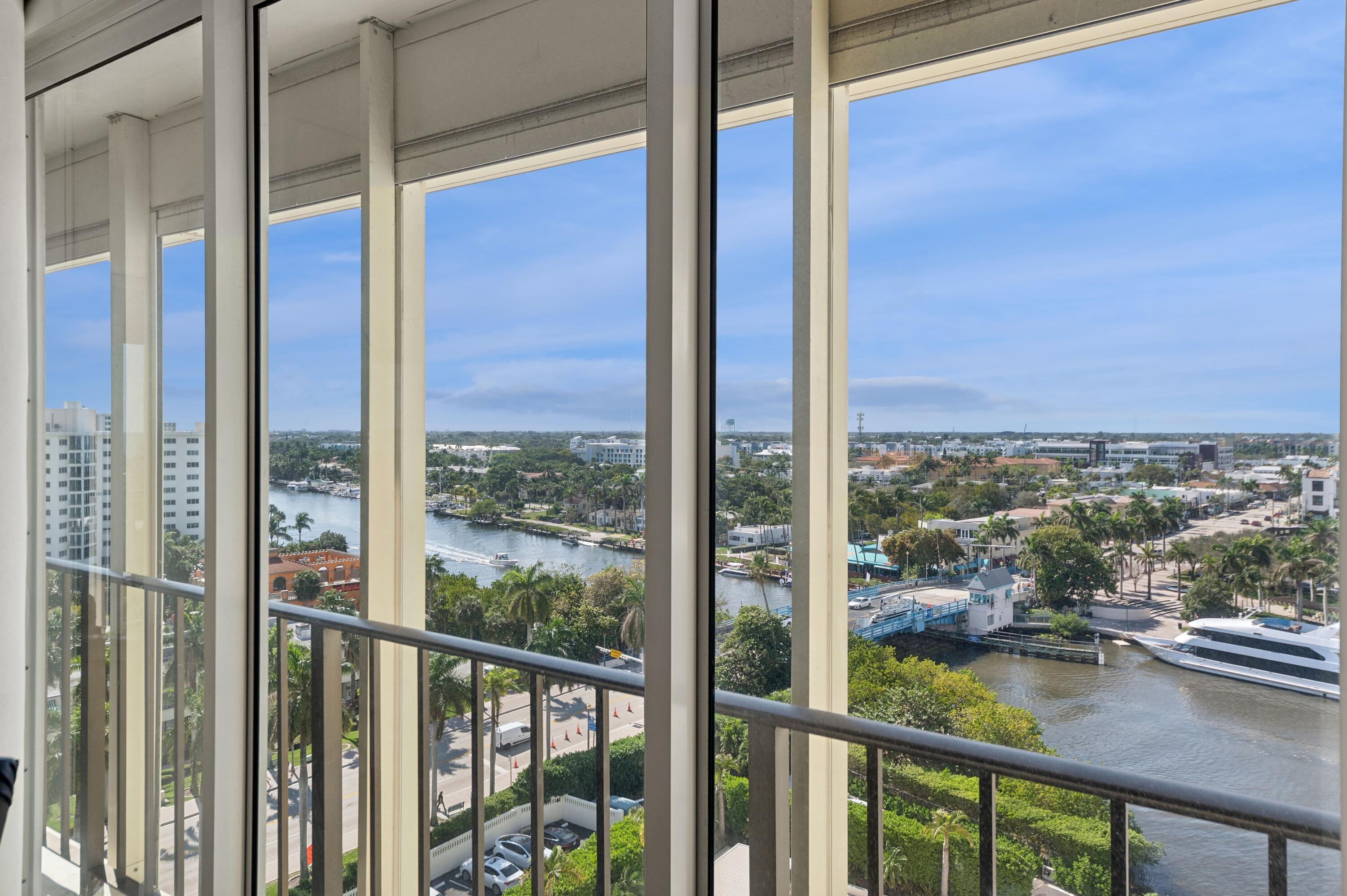 50 E Road, Unit 11F Delray Beach, FL 33483 - Photo 9 of 31 a view of a glass door and porch