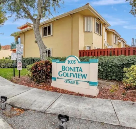 a sign on the side of a building