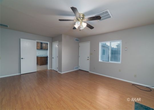 324 West Ward Avenue Ridgecrest, CA 93555 - Photo 6 of 32 a view of an empty room with a window