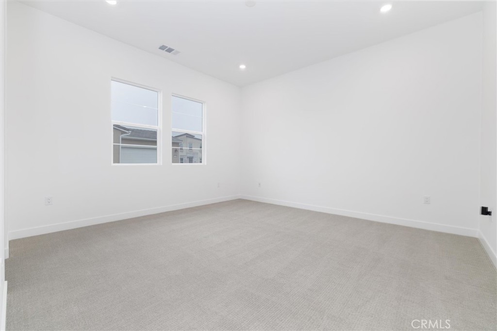 24510 Via La Valencia, CA 91354 - Photo 12 of 25 an empty room with a window