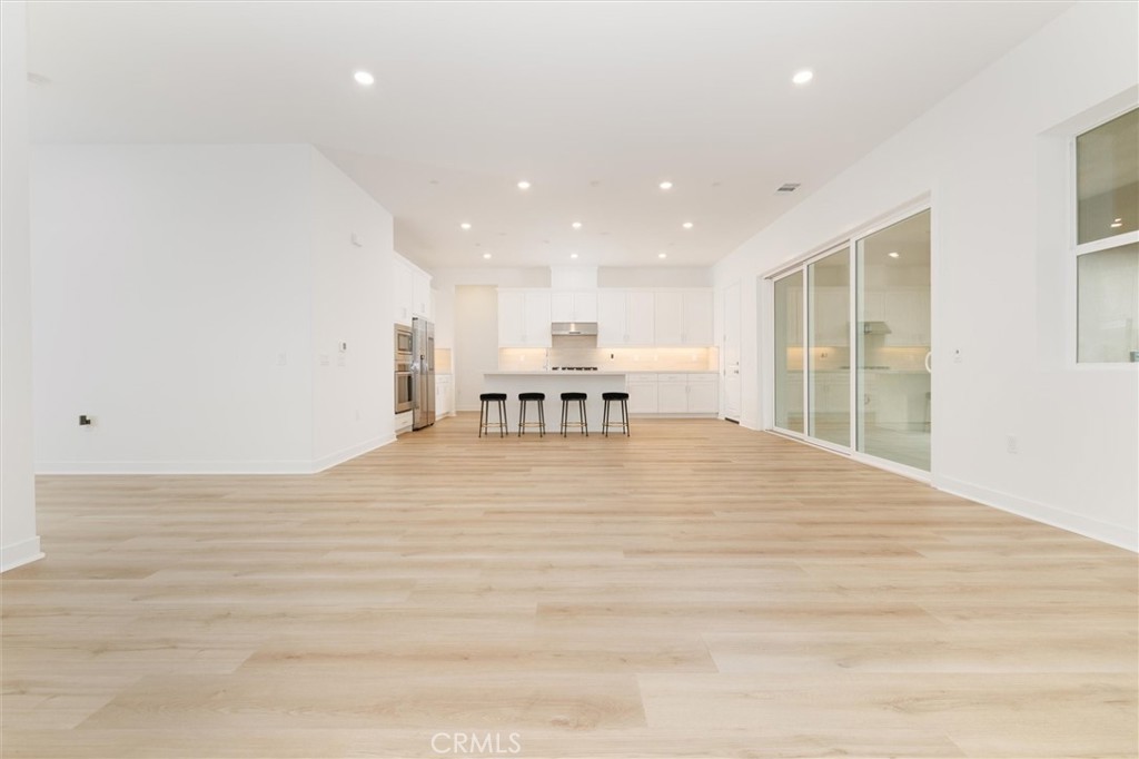 24510 Via La Valencia, CA 91354 - Photo 8 of 25 a view of kitchen with furniture and a window