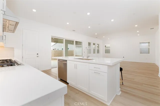 a bathroom with a sink a vanity and a mirror