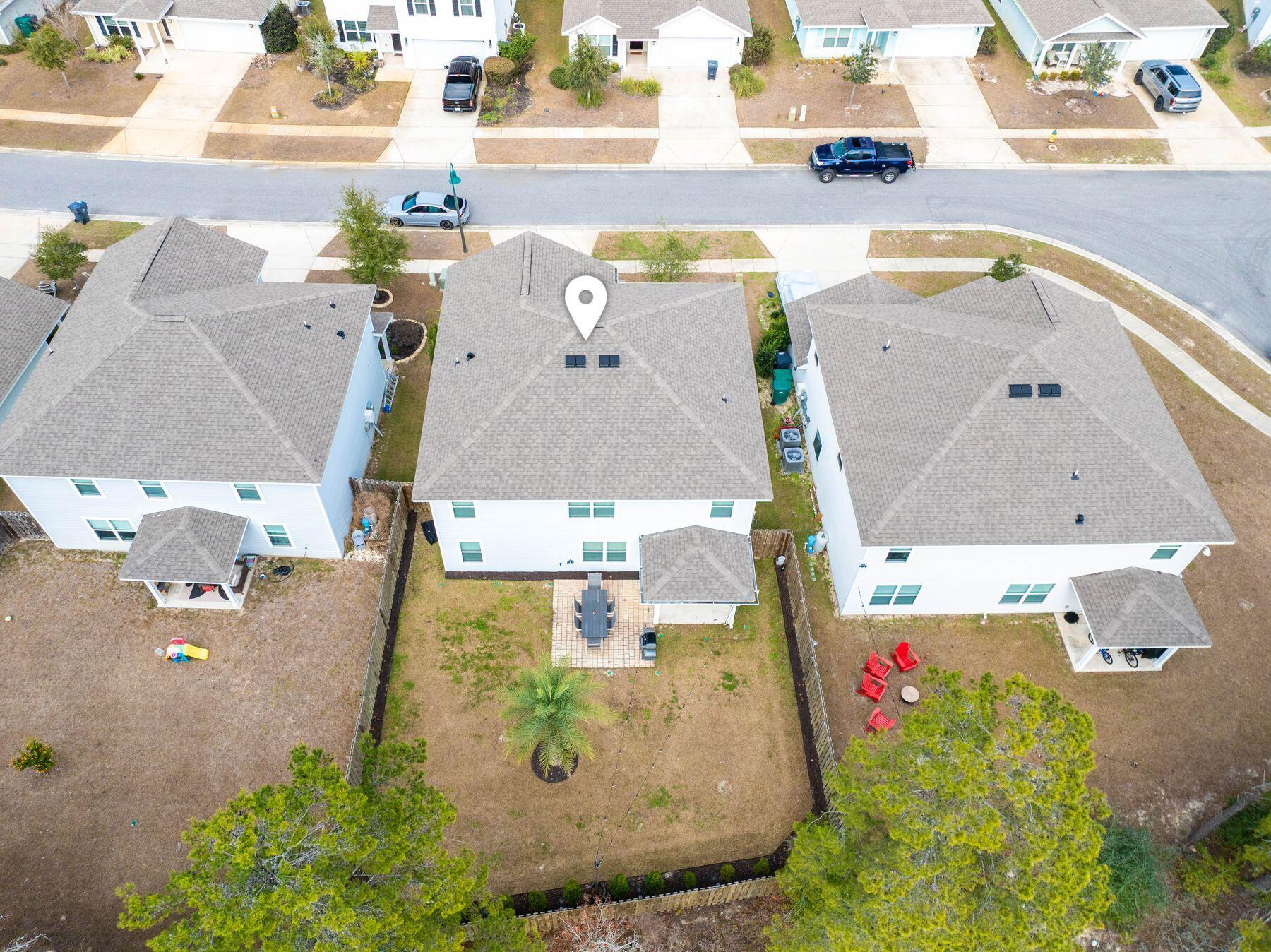 396 This Way Freeport, FL 32439 - Photo 24 of 30 an aerial view of a house with a swimming pool