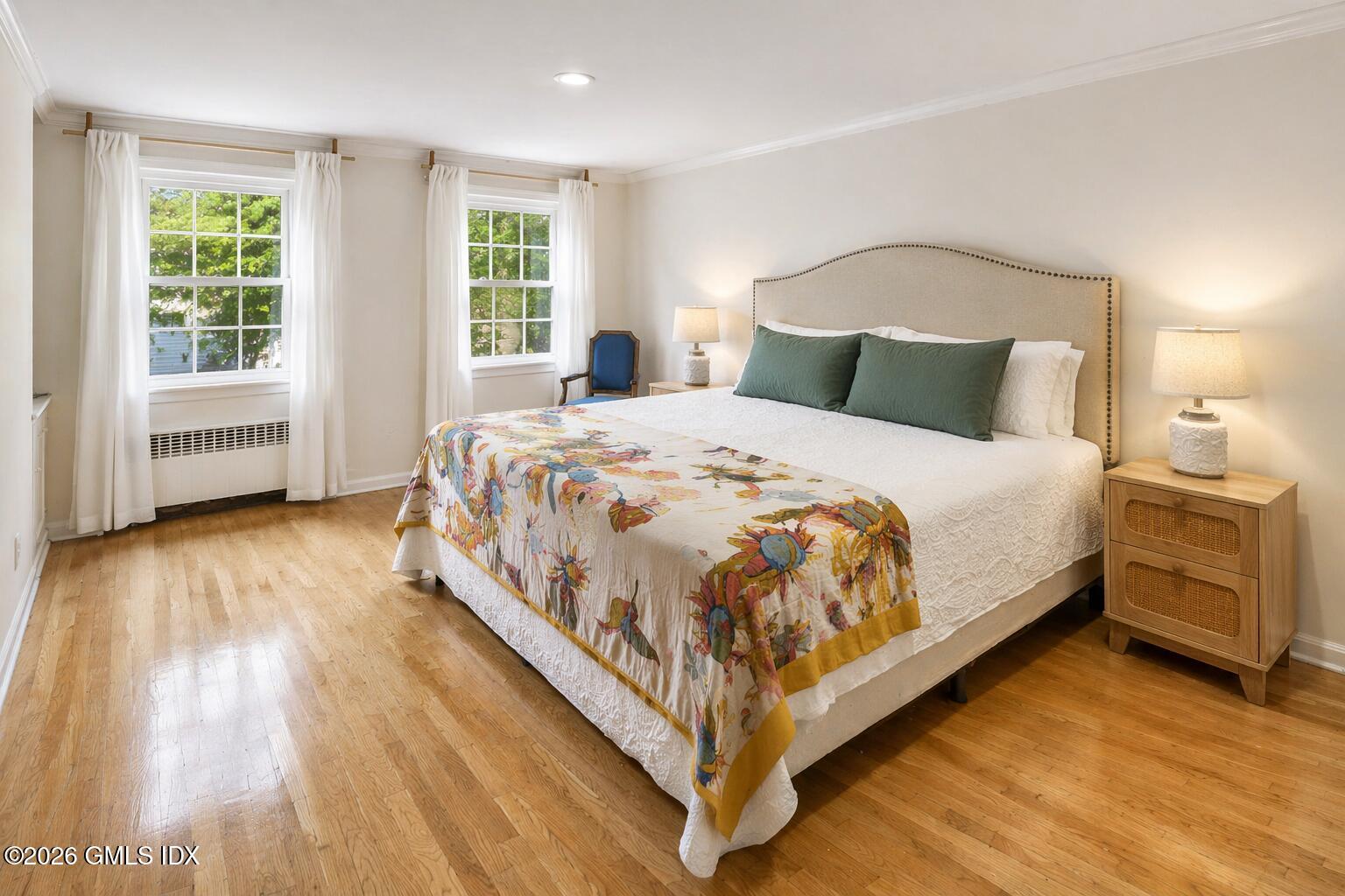 64 Summit Road Riverside, CT 06878 - Photo 13 of 34 a large bed sitting in a bedroom next to a window