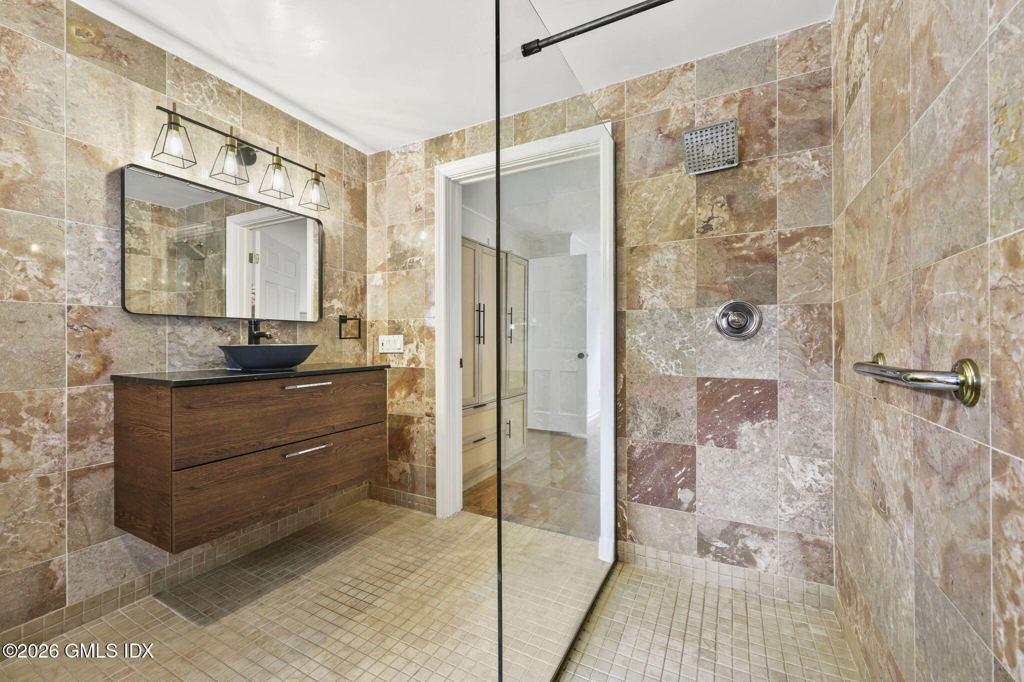 64 Summit Road Riverside, CT 06878 - Photo 15 of 34 a bathroom with a granite countertop sink mirror and shower