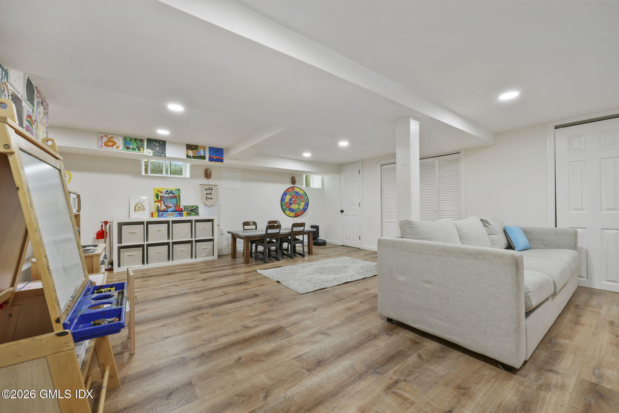 64 Summit Road Riverside, CT 06878 - Photo 24 of 34 a living room with furniture and a wooden floor