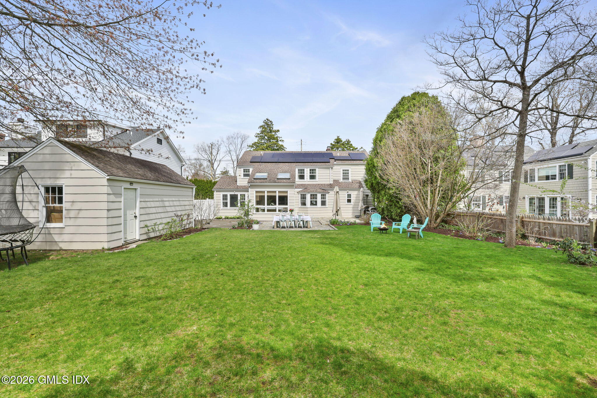 64 Summit Road Riverside, CT 06878 - Photo 29 of 34 a view of a house with a backyard