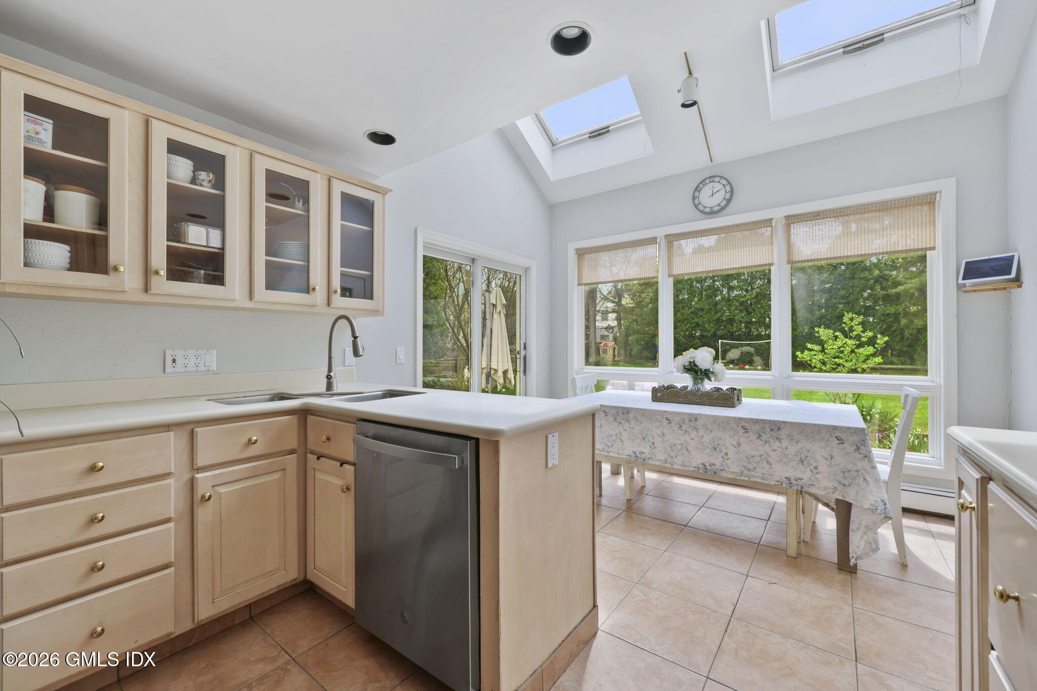 64 Summit Road Riverside, CT 06878 - Photo 10 of 34 a view of a kitchen with kitchen island granite countertop a sink and a stove