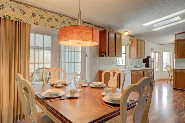 a view of kitchen island dining table and chairs