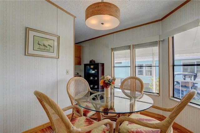 a room with table and chairs