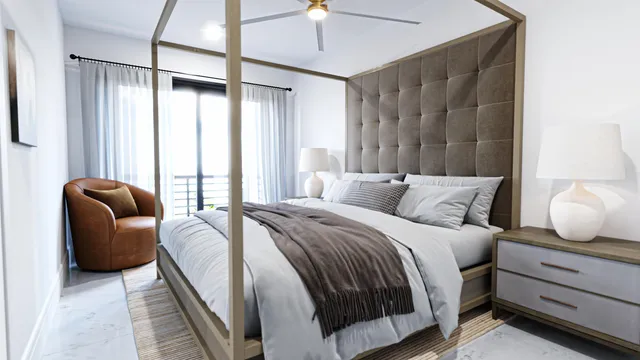 a bedroom with bed couch and window